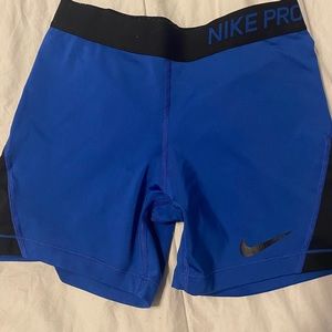 Dark blue Nike Pros size large